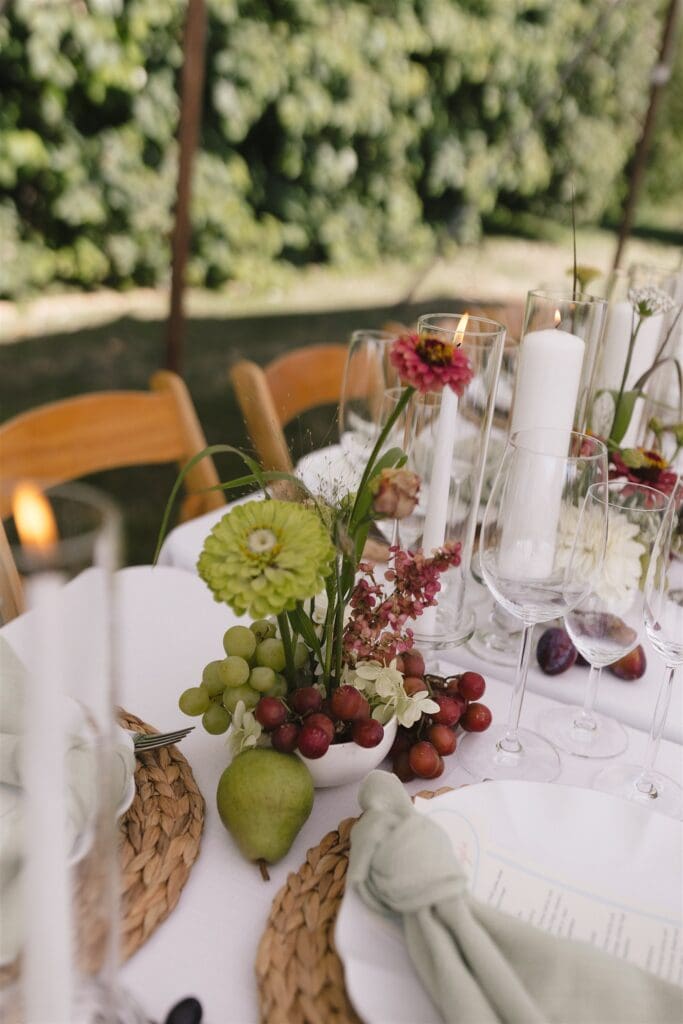 Santucci Farm wedding table settings with grapes and fresh florals
