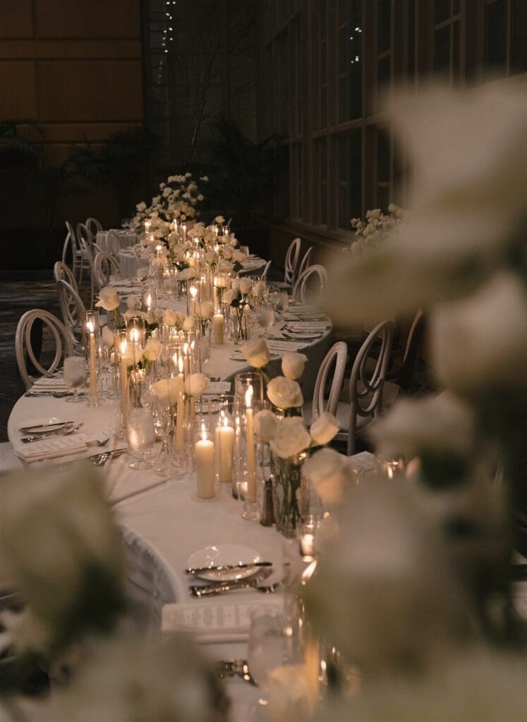 Luxury black-tie wedding reception in Seattle with white floral installations