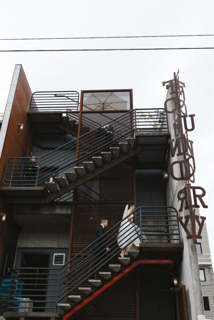 Bride and groom photos on the rooftop of Fremont Foundry