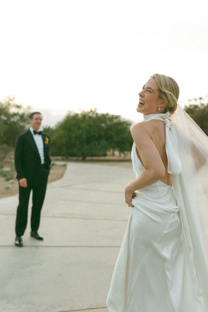Bride and groom on film in Cabo at Acre Resort