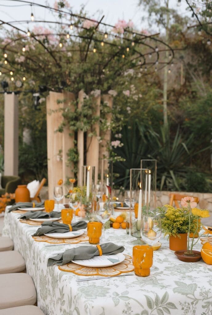 Green, orange, and fuschia wedding table centerpieces