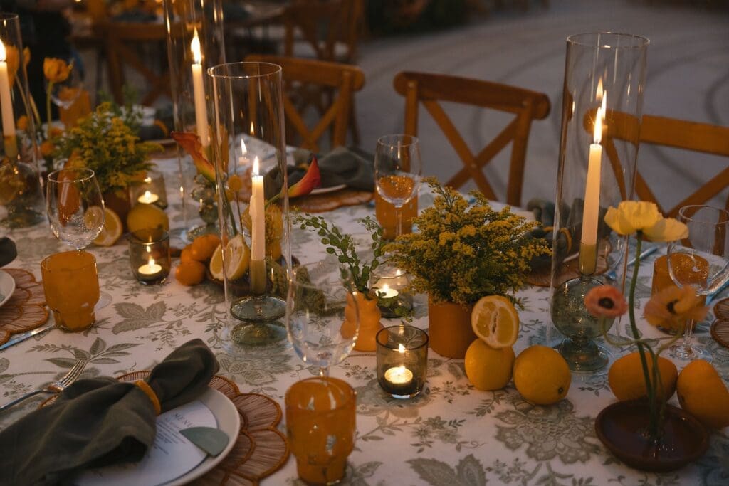 Green, orange, and fuschia wedding table centerpieces