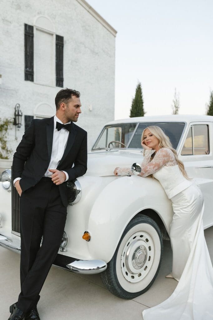 Bride and groom spring wedding portraits in Chattanooga with an old car
