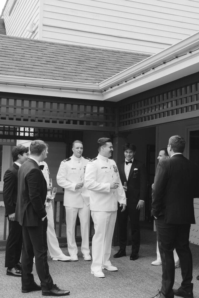 Groom and groomsmen stand outside of Columbia Collective in Woodinville